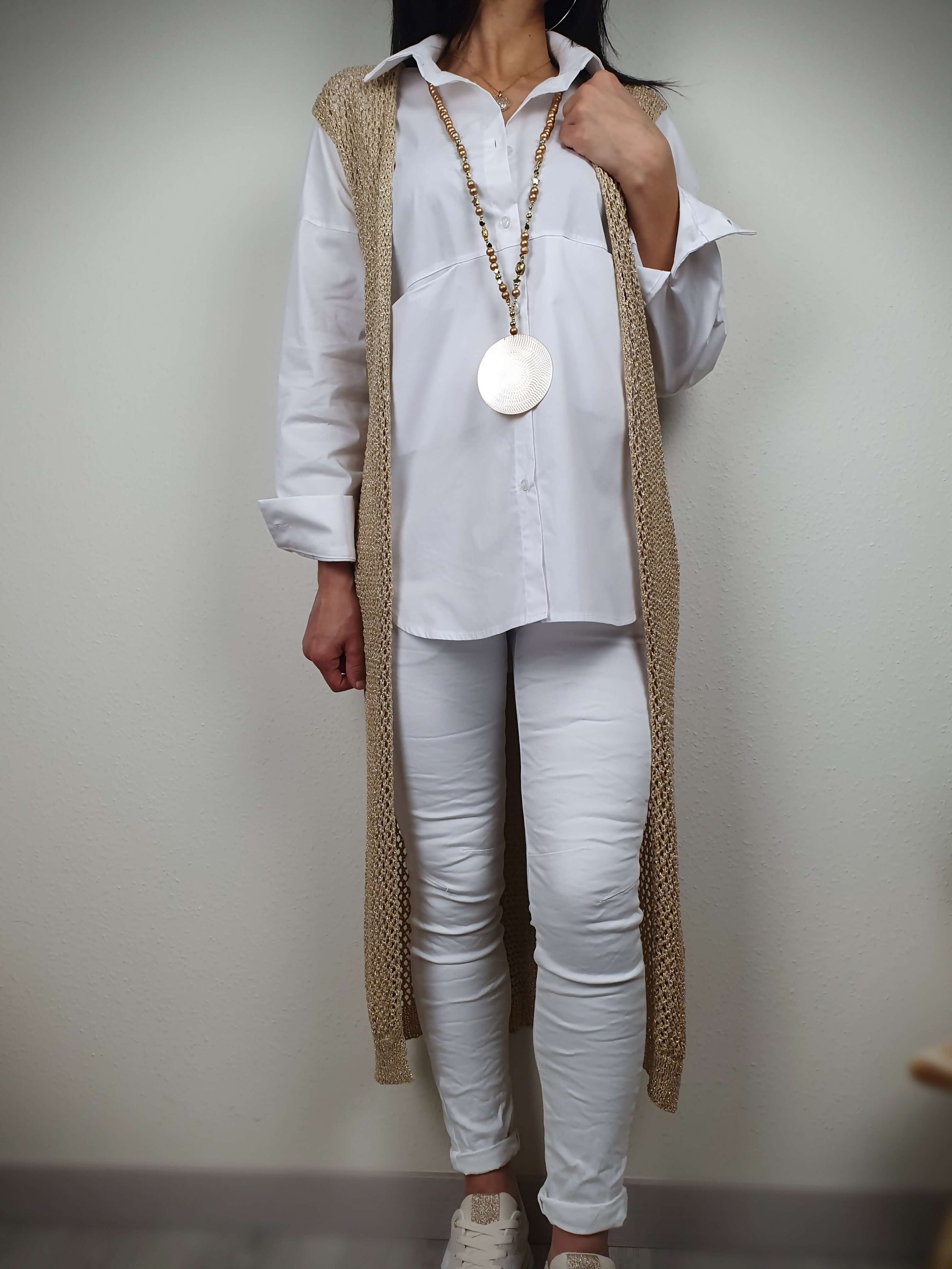 Gilet sans manche crochet en lurex doré à découvrir sur www.gayano.fr